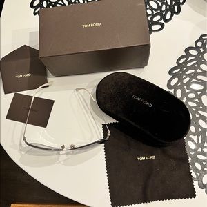 Tom Ford sunglasses case, box, cleaning cloth, and authenticity card